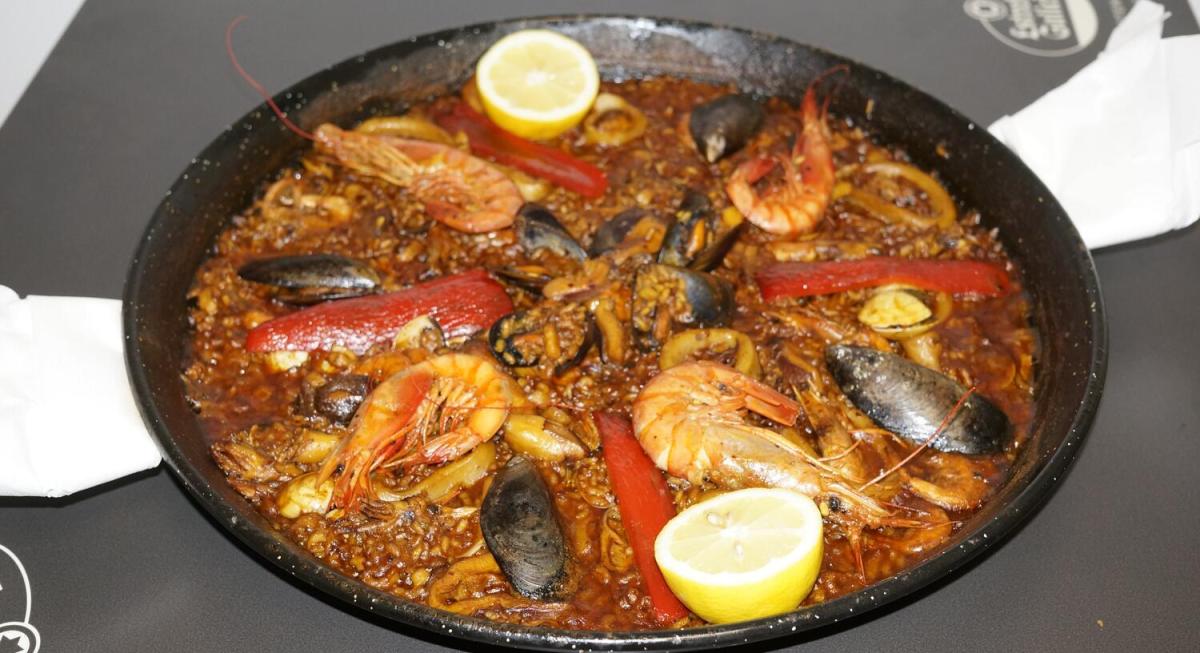 Paella — Traditional Spanish saffron rice dish at Tapería La Mina Benidorm
